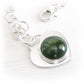 Handmade sterling silver charm bracelet with a memorial glass focal cabochon set on a silver heart