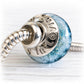 Handcrafted glass memorial charm bead on a sterling silver snake chain with a silver spacer bead