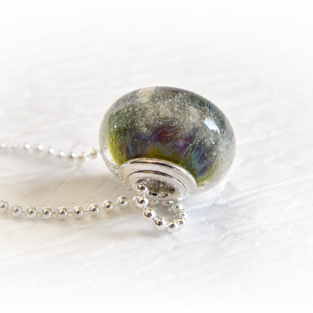 Green, blue and amber artisan-crafted glass remembrance bead on a sterling silver bead chain