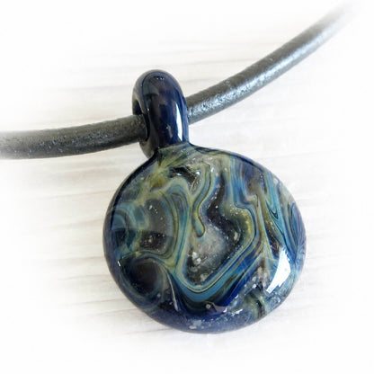 Memorial glass pendant hand blown from Lapis glass and swirls of cremation ashes