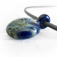 Artisan made glass cremation pendant handcrafted with cremation ashes and Lapis glass 