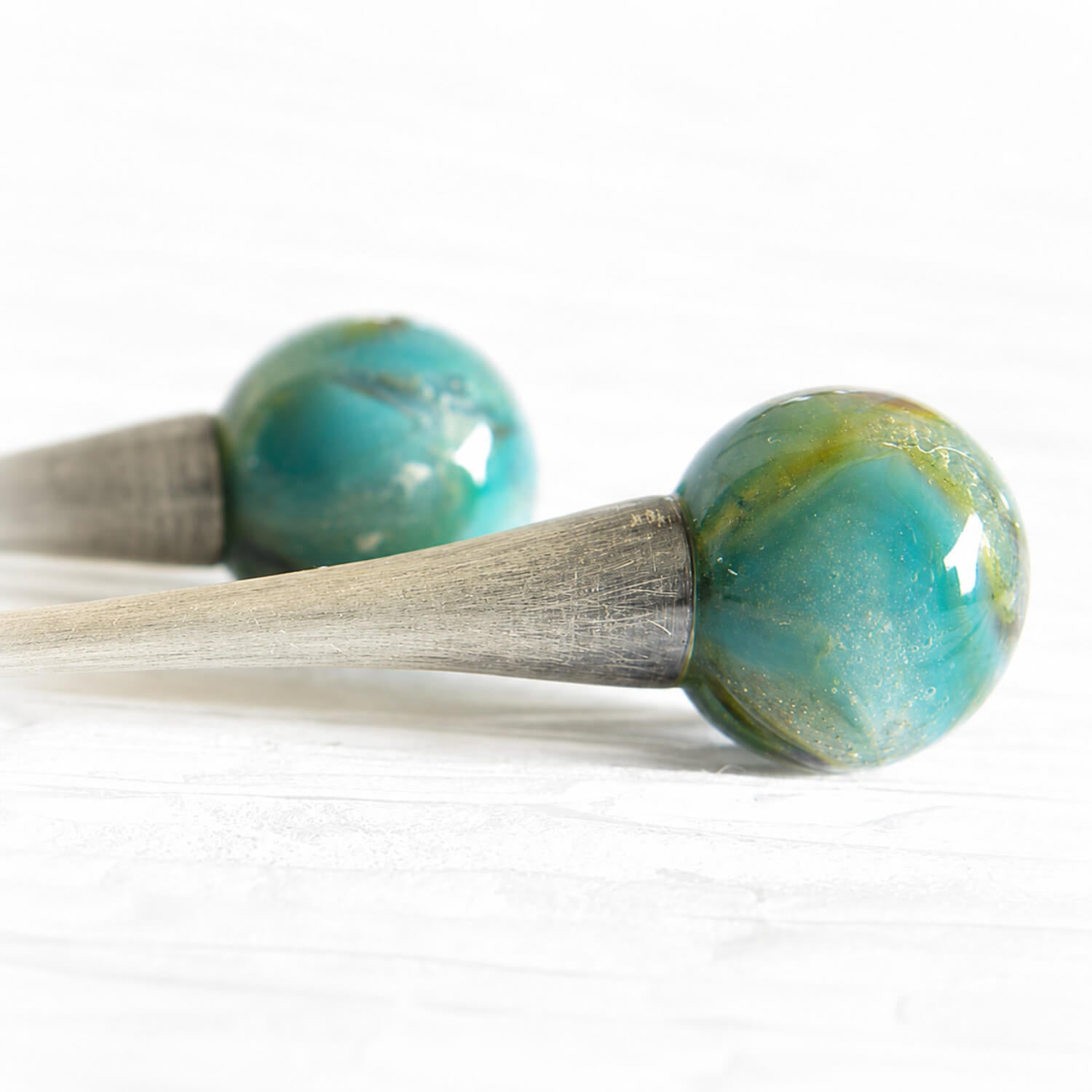 Pet ashes swirled with turquoise and amber glass set on sterling silver dangle earrings
