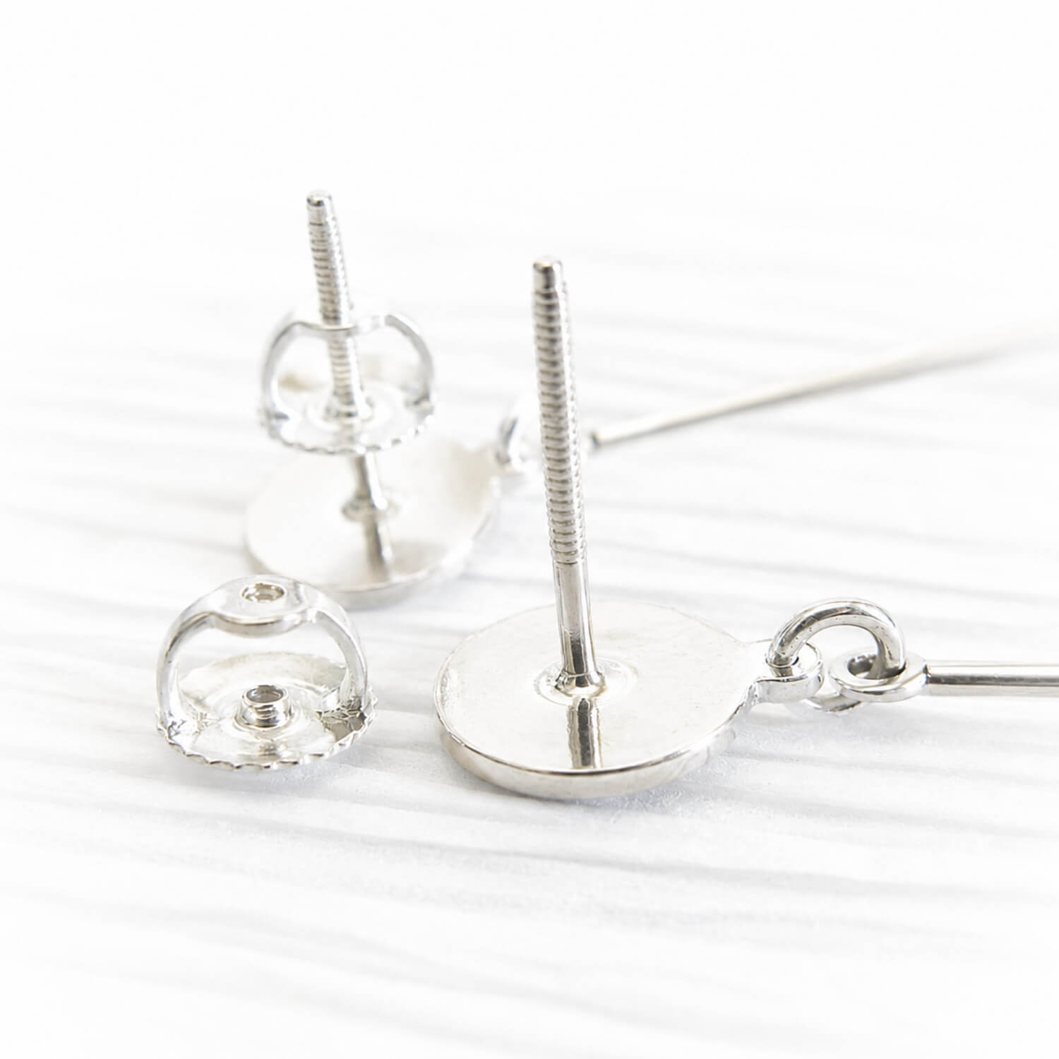 Sterling silver threaded posts and backs on dangle earring 
