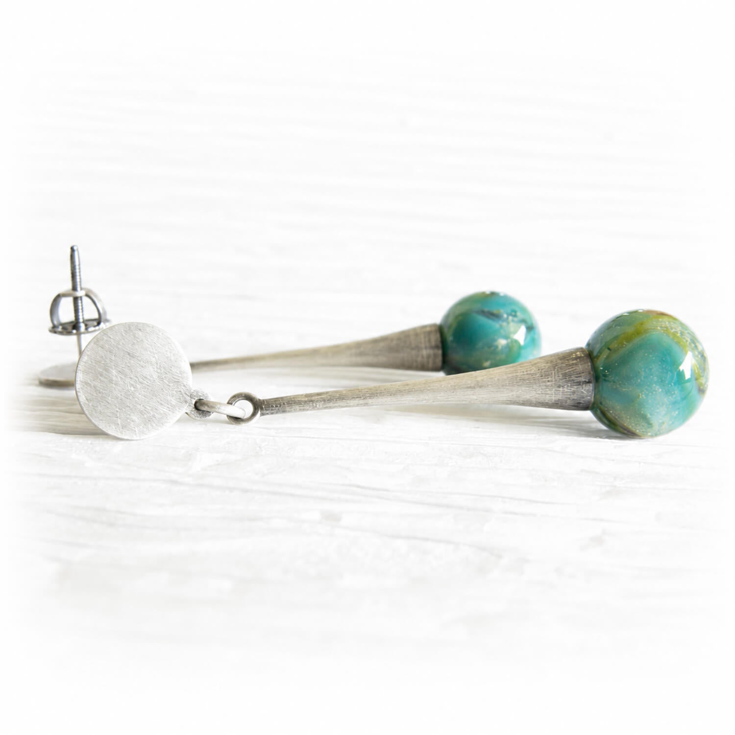 Sterling silver memorial earrings with an antique finish paired with artisan-crafted glass marbles 