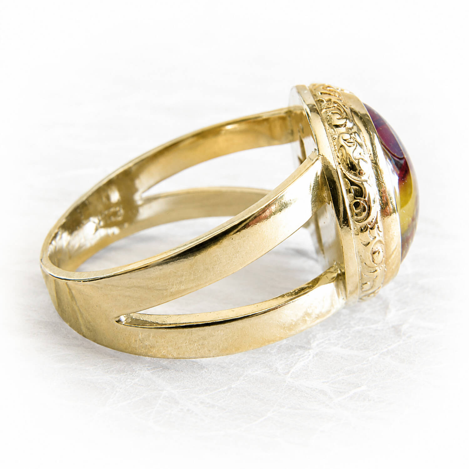 14k gold memorial ring with cremation ashes encased in hand blown glass