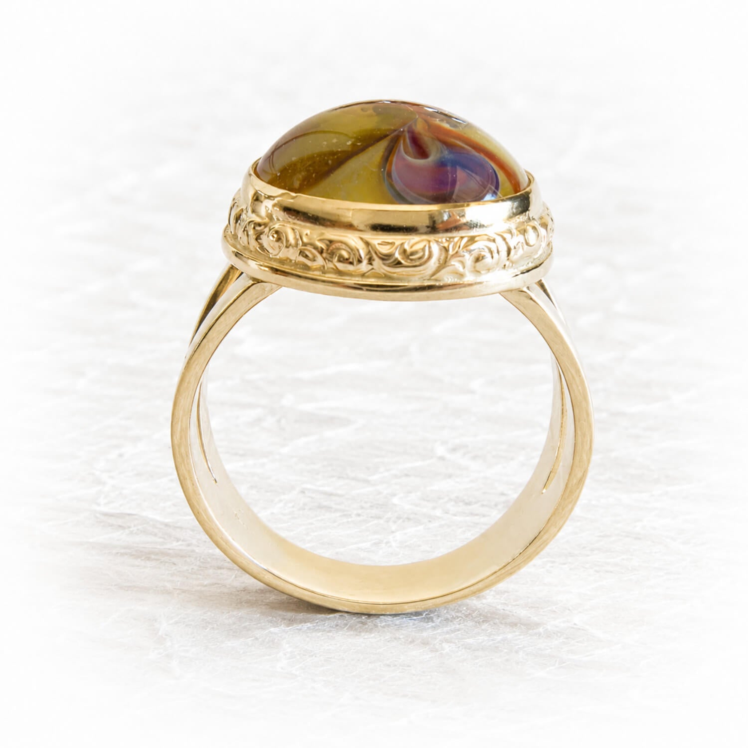 Solid 14k gold ring with a colorful cremation stone made from hand blown glass