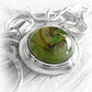 Sterling silver memorial pendant with a handcrafted ash-infused green glass cabochon