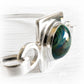 Handcrafted memorial glass infused with cremation ashes set in polished sterling silver