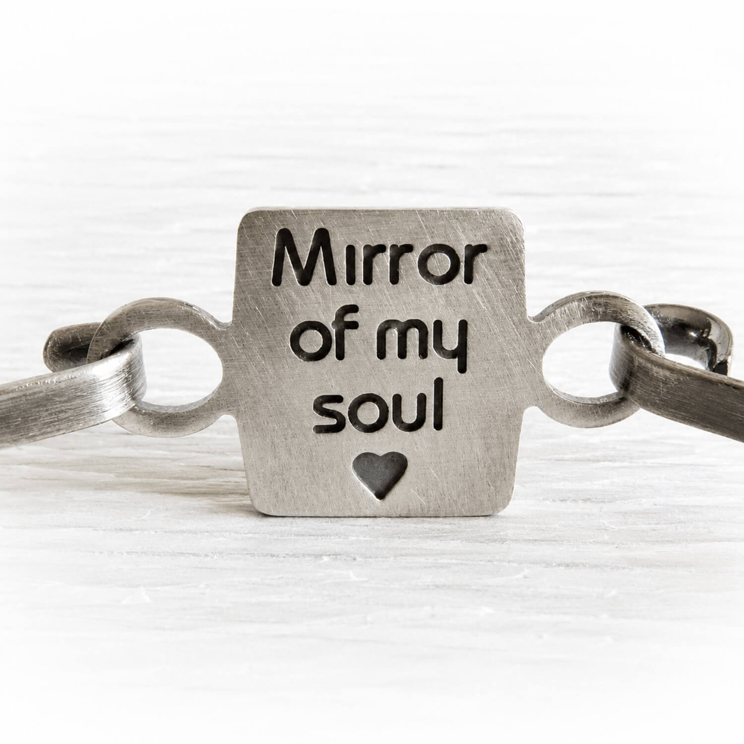 Custom engraving on the back of sterling silver memorial bracelet that says 'Mirror of my soul' 