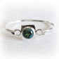 Sterling silver memorial bangle bracelet with a glass center piece infused with pet ashes