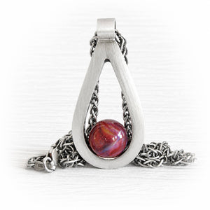 Sterling silver memorial teardrop pendant with a brushed finish and a handcrafted glass centerpiece