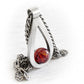 Colorful hand blown glass marble with ashes permanently encased in glass set in a sterling silver memorial pendant