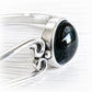 Black hand blown glass handcrafted with cremation ashes in a sterling silver memorial cuff bracelet