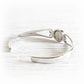 Back side view of a sterling sterling silver memorial cuff bracelet with a .925 hallmark
