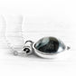 Dainty sterling silver pendant with a handmade glass gem stone made with ashes suspended within the glass