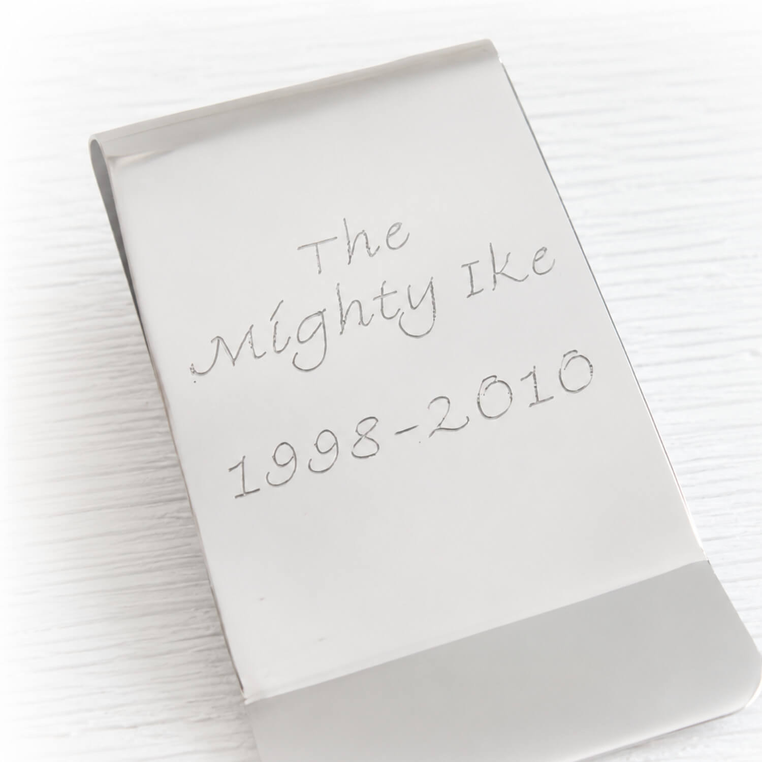 Custom engraving on a sterling silver memorial money clip 