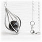 Sterling silver  pendant with a black flamework marble infused with a loved ones ashes
