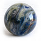 Large memorial marble made with blue lampworked glass hand crafted showing floating ashes within the glass