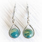 Green and turquoise glass marbles swirled with cremation ashes on polished sterling silver earrings 