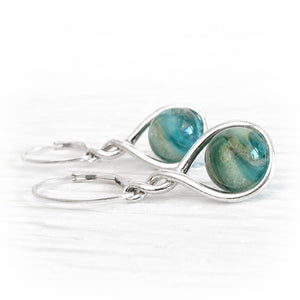 Turquoise and aqua cremation glass swirled with pet ashes set on sterling silver earrings with leverbacks 