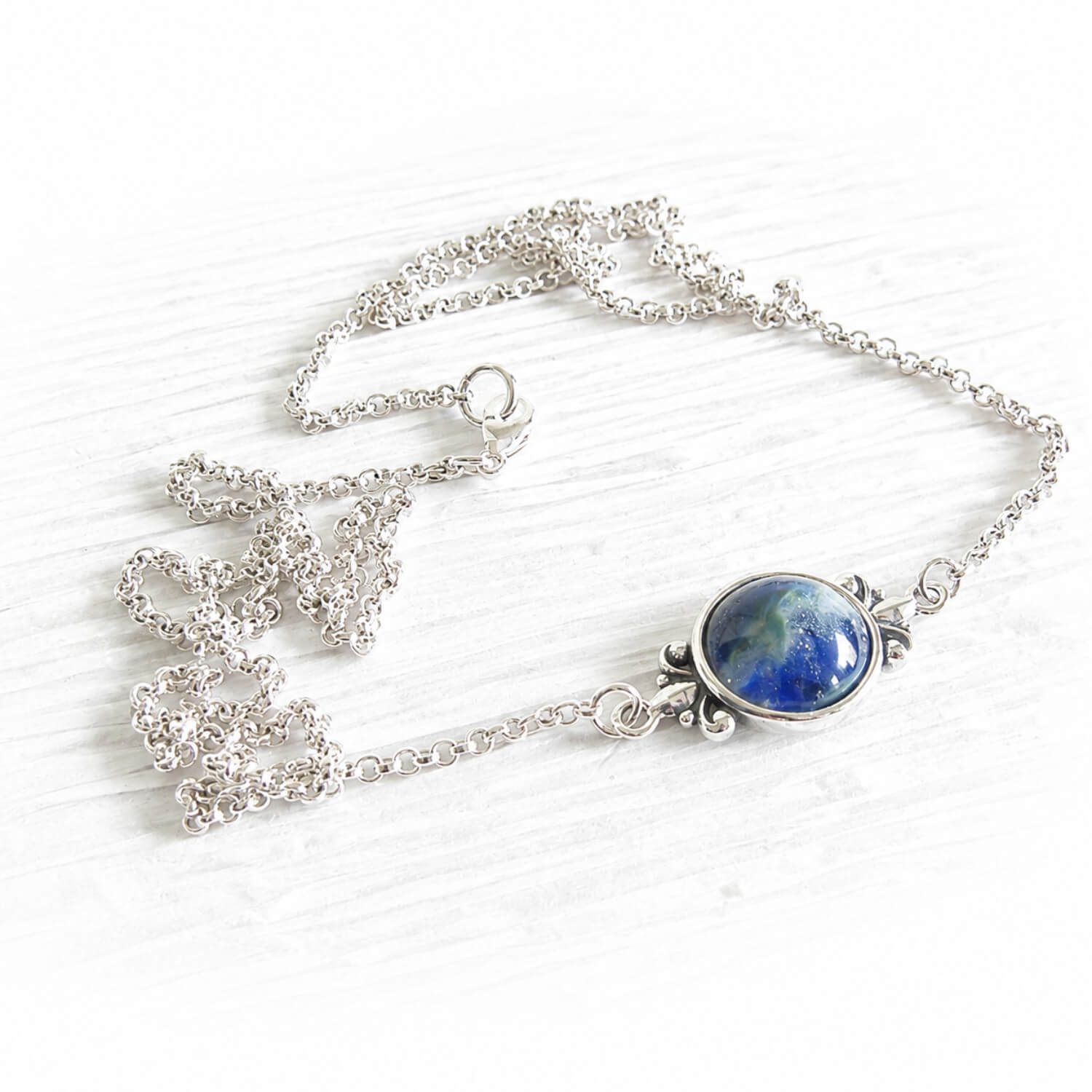 Sterling silver memorial necklace with blue hand blown cremation glass 