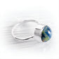Ashes suspended within blue and green hand blown glass set in a sterling silver memorial ring