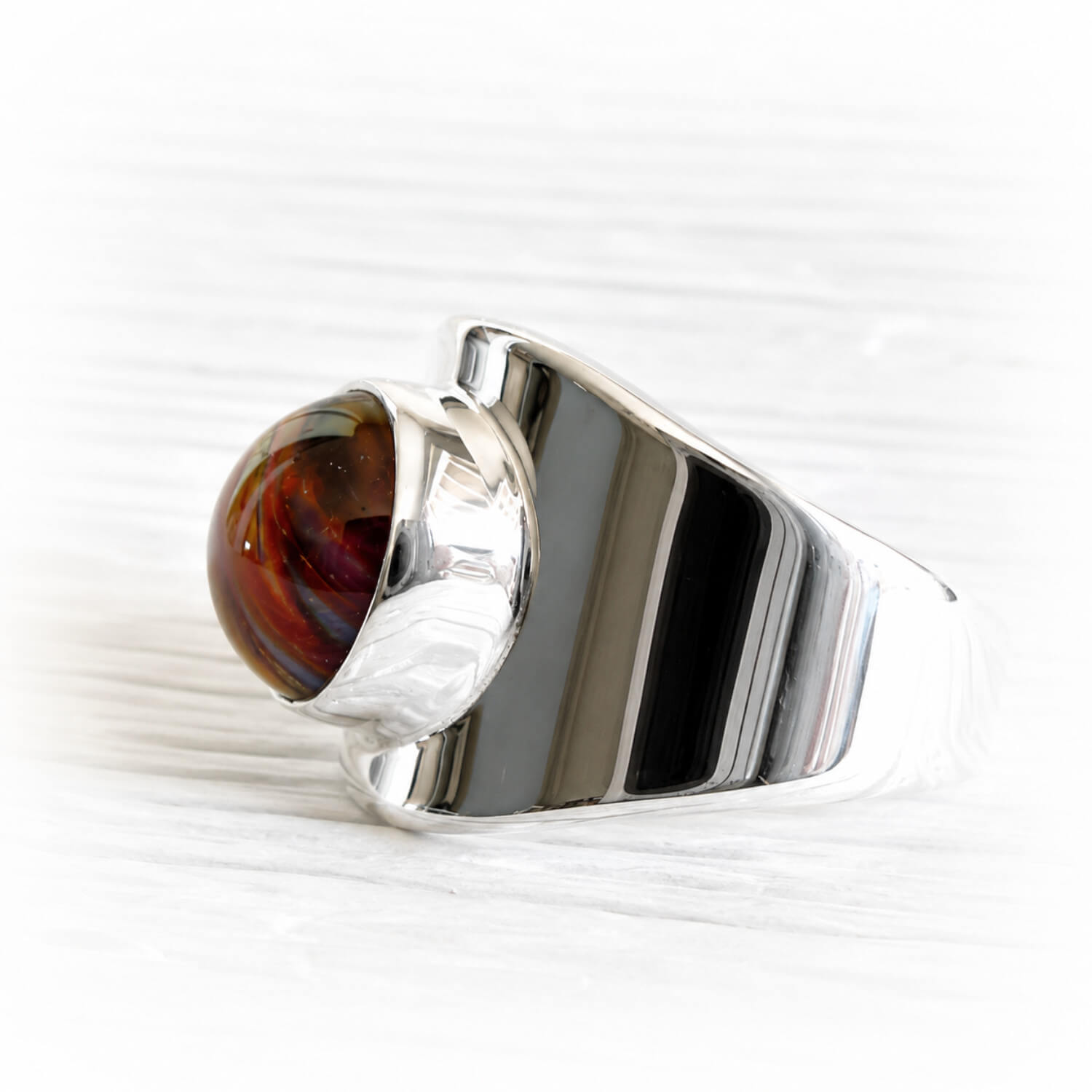 Sterling silver memorial ring with a deep red hand blown glass cremation gem stone 