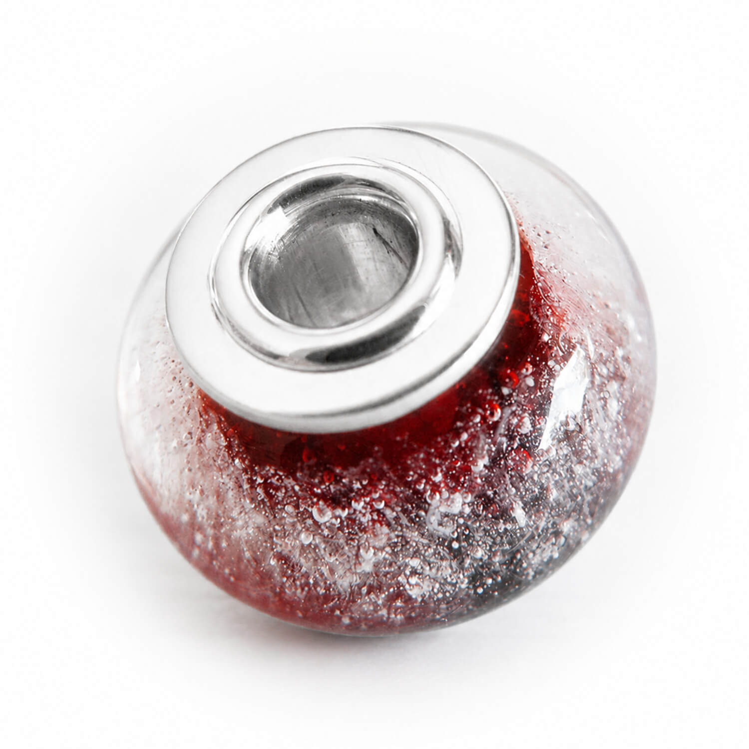 Dark red glass bead infused with cremation ashes set with sterling silver bead caps