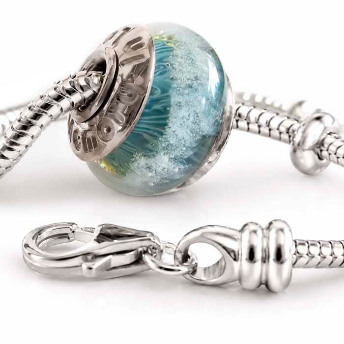 Sterling silver charm bracelet with a hand crafted ash infused bead with silver bead caps