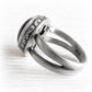 Antique finish on a sterling silver cremation ring with a cross cutout on the back