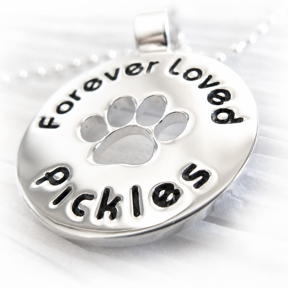 Sterling silver pendant with paw print and 'Forever Loved Pickles' text on a white background