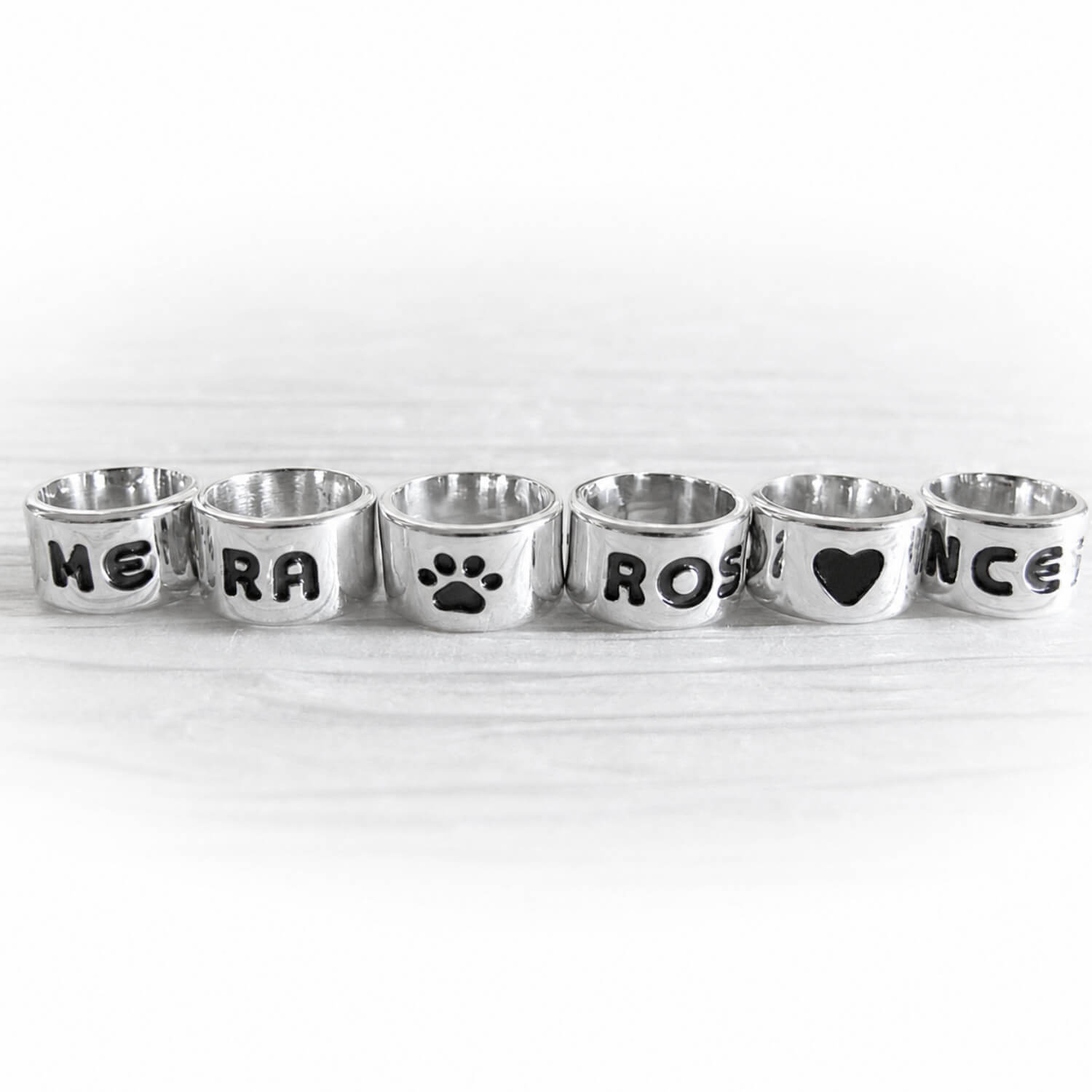 Set of handmade polished sterling silver slider beads with customized engraving