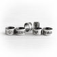 Set of handmade sterling silver slider beads with personalized engraving and an antique finish