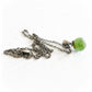 Swirled green and brown Sparkling Island glass marble on a sterling silver memorial necklace