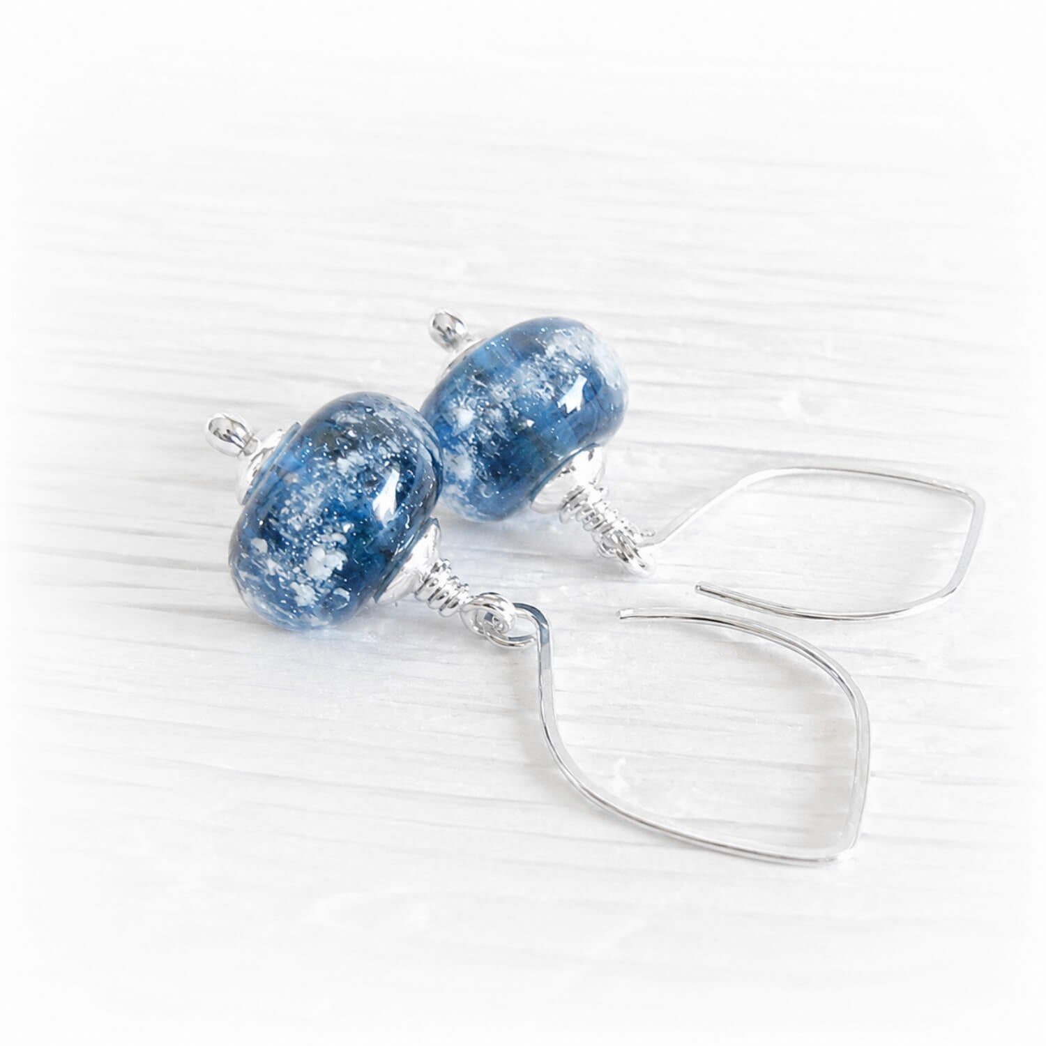 Sparking Island memorial bead earrings hand blown with blue glass pared with sterling silver hooks