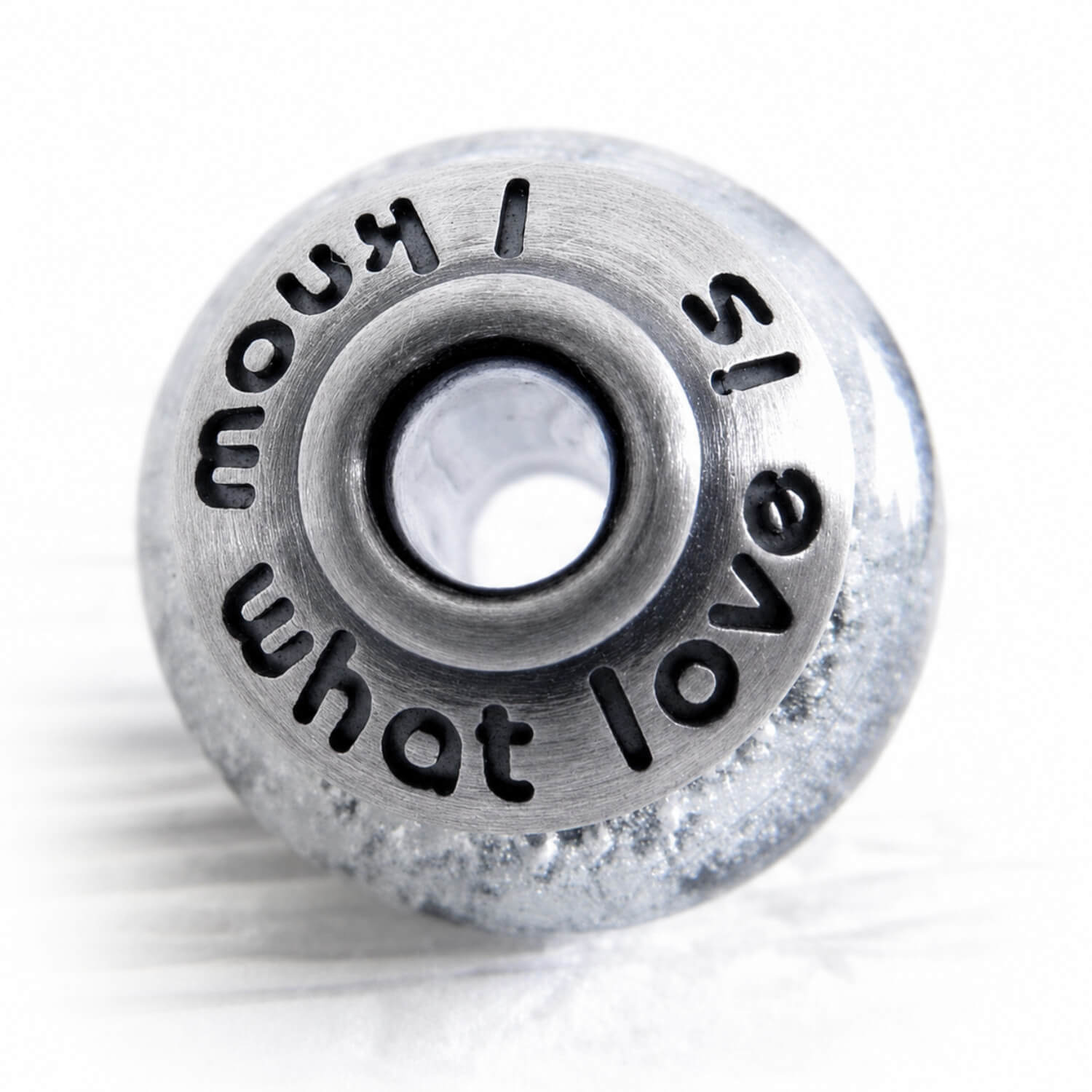 Antique finished sterling silver bead caps with personalized engraving on a glass bead