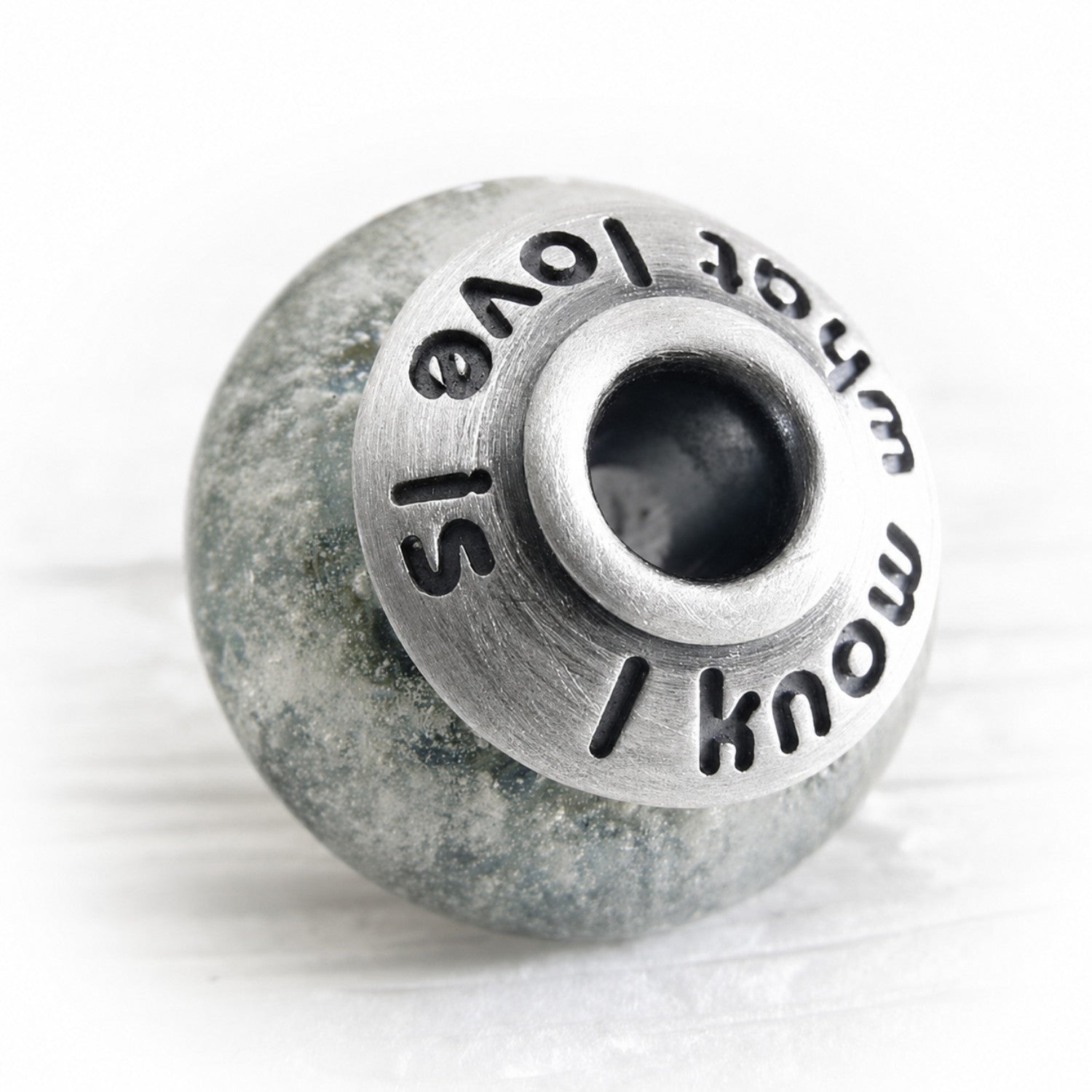 custom engrave bead caps with an antique finish on a memorial bead