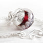 Sterling silver pet memorial necklace with a deep red hand blown glass bead