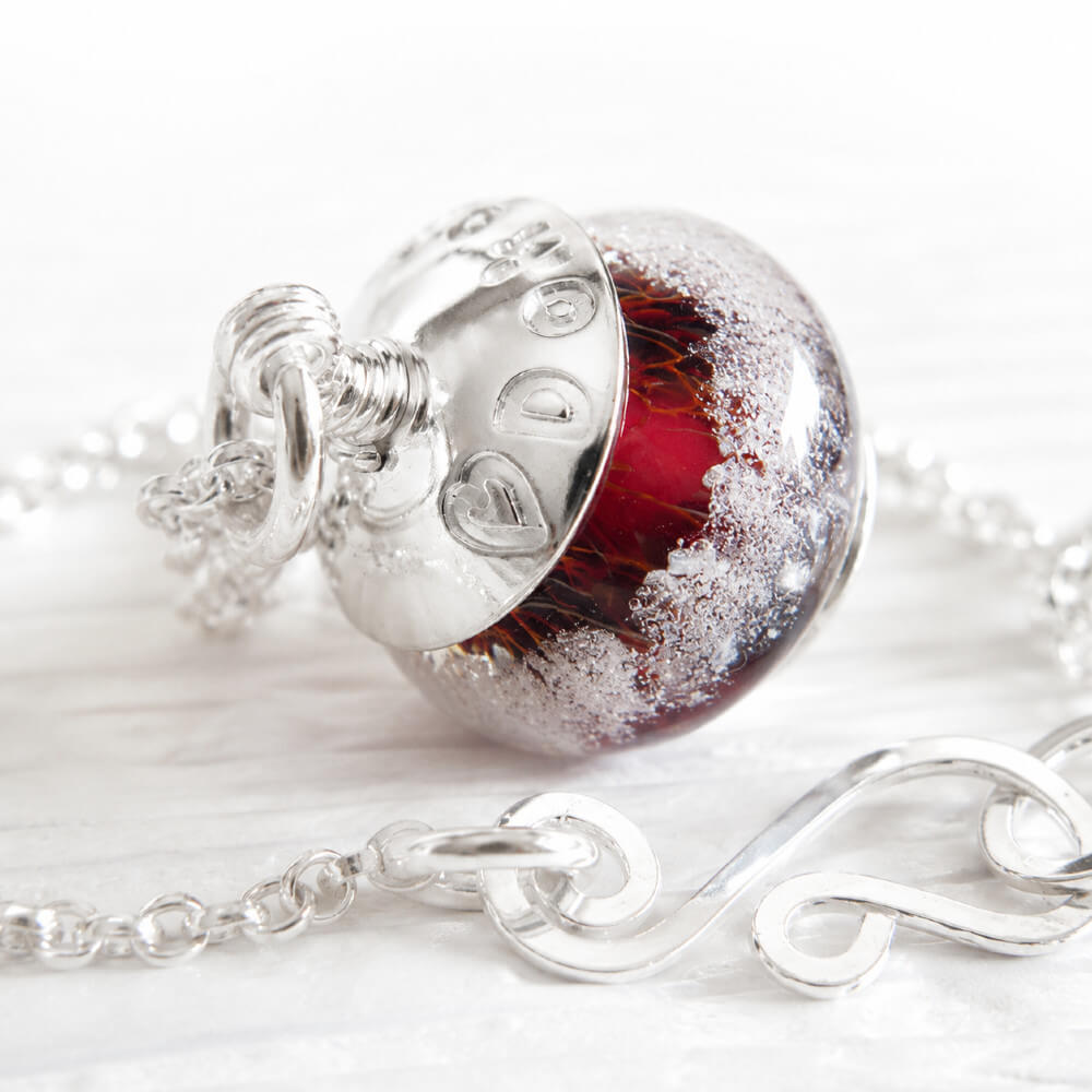 Sterling silver pet memorial necklace with a deep red hand blown glass bead