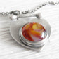 Handcrafted antiqued sterling silver keepsake lariat necklace with cremation ashes sealed within the glass
