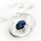 Solid sterling silver memorial pendant with swirled blue glass handcrafted with cremation ashes