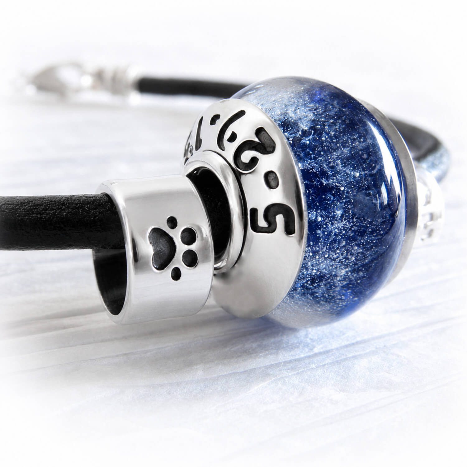 Blue hand handmade sterling silver slider beads with personalized engraving and an antique finish