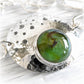 Artisan crafted glass memorial stone set in a hand forged sterling silver bracelet