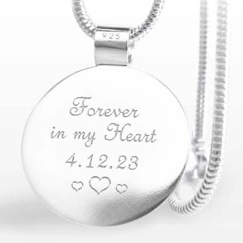 Sterling silver tribute necklace pendant with 'Forever in my Heart 4.12.23' custom engraving on a white background