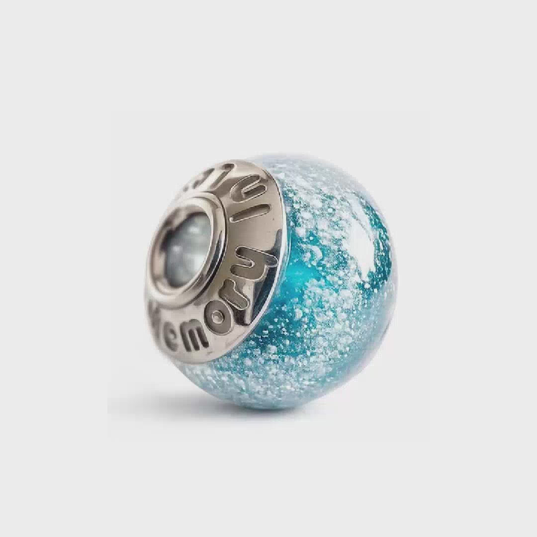 Load video: Video of a custom pet memorial bead made for a frenchie dog